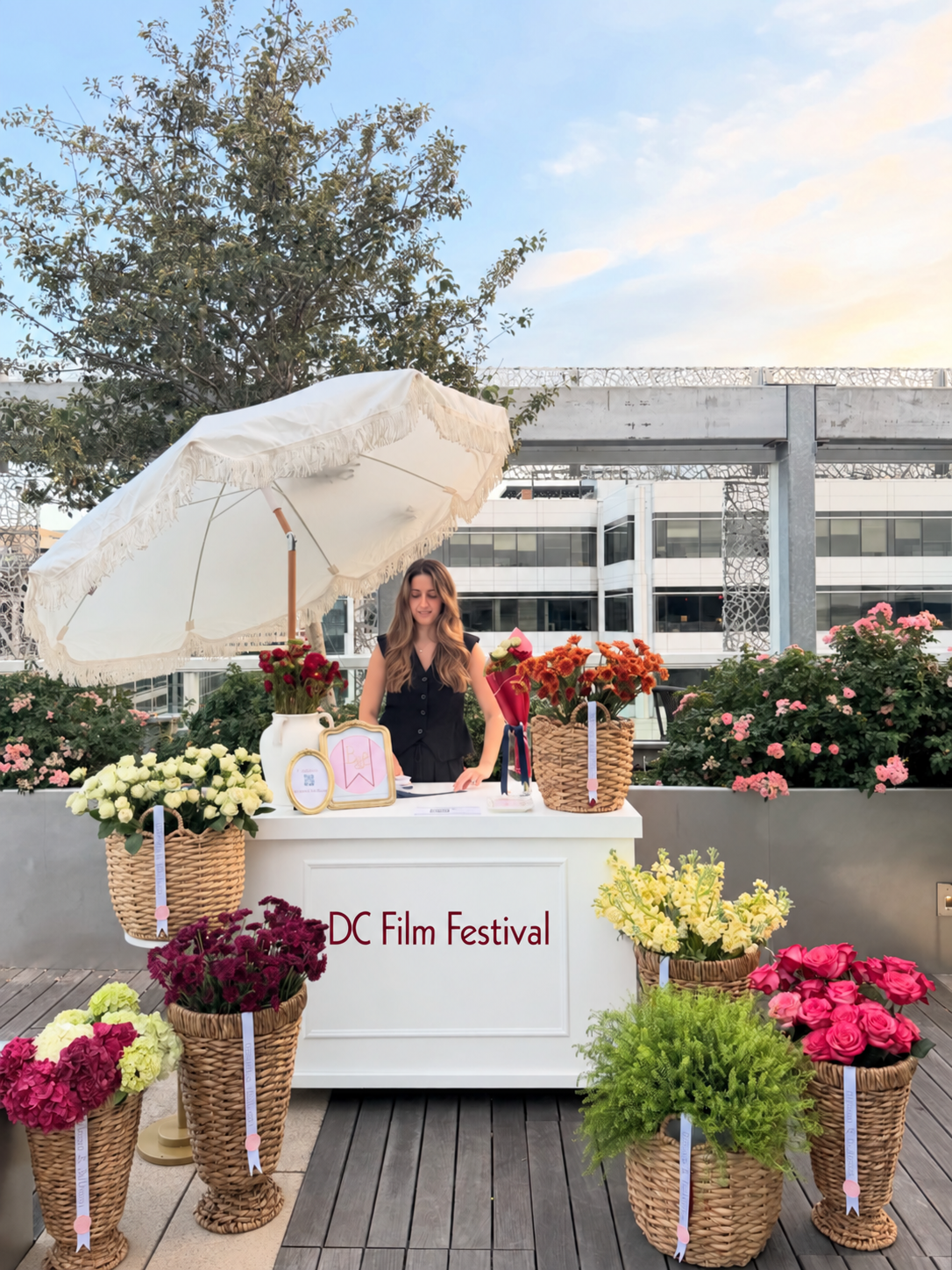 Dunja with a Bloom Bar floral display at the DC Film Festival