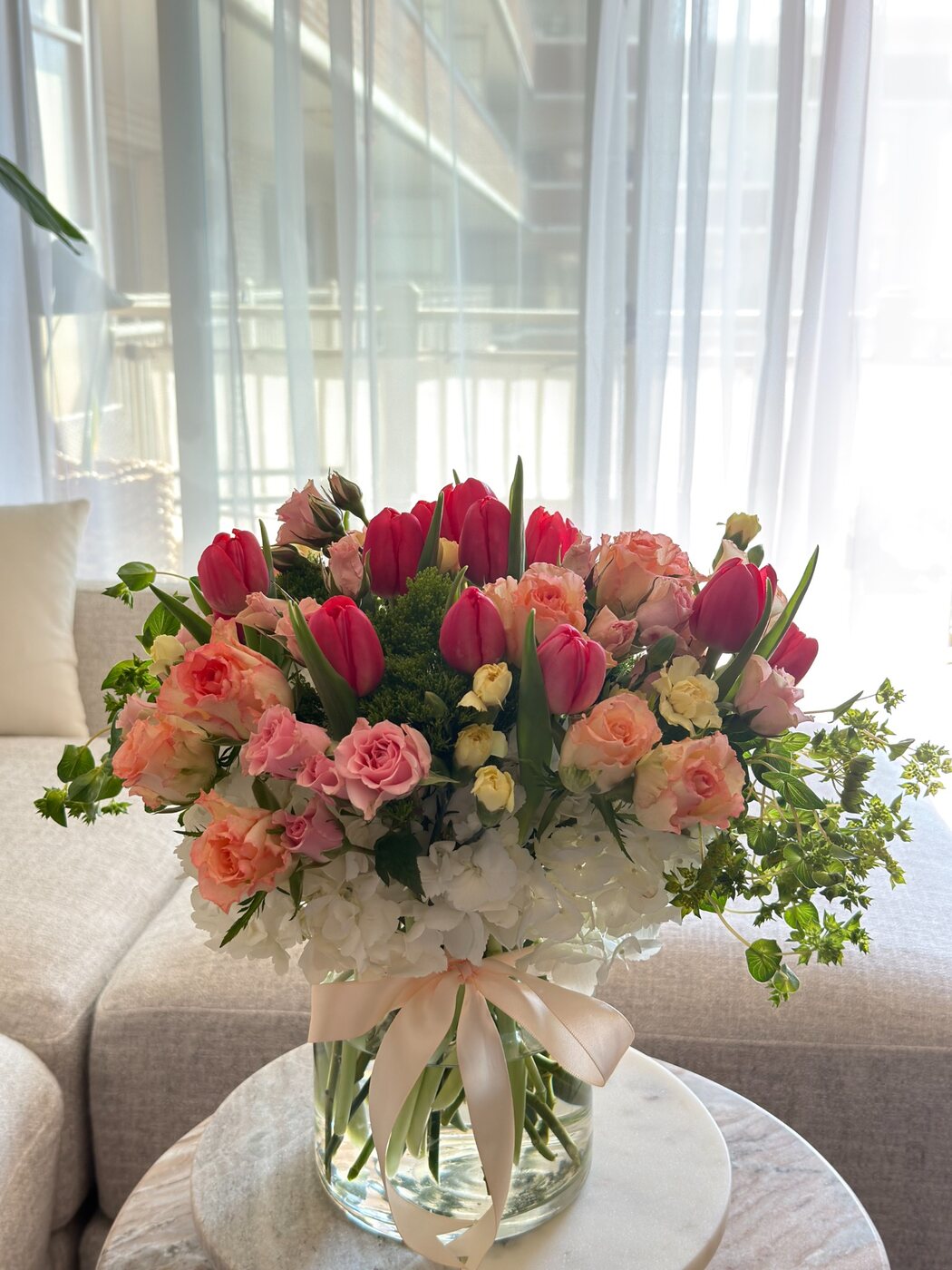 Colorful floral arrangement by Bloom & Balloon
