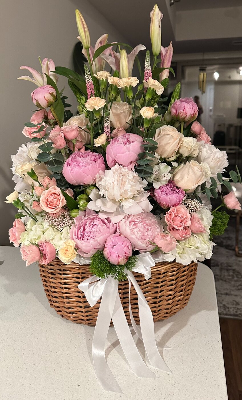 Pink and white floral basket