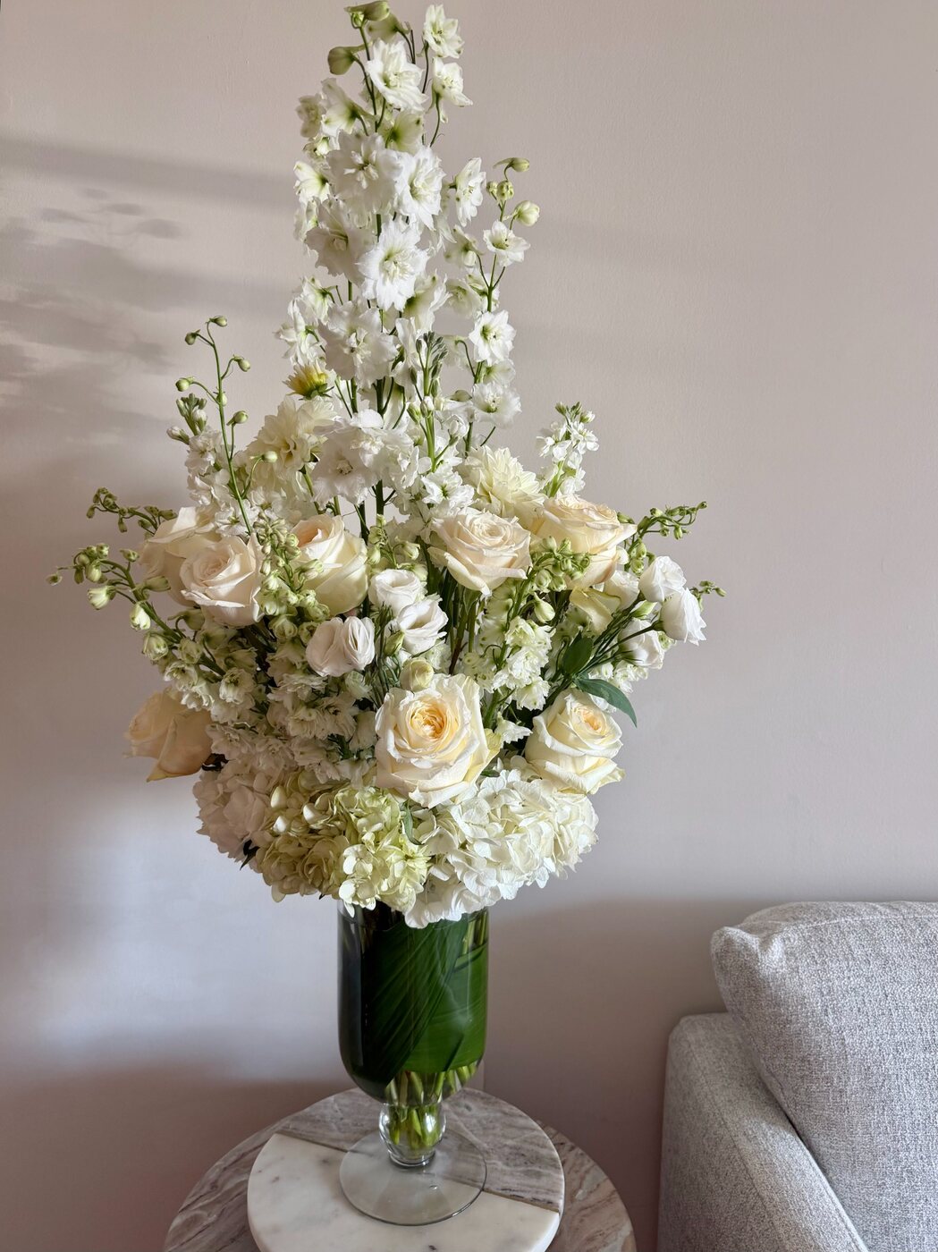 Tall white floral arrangement